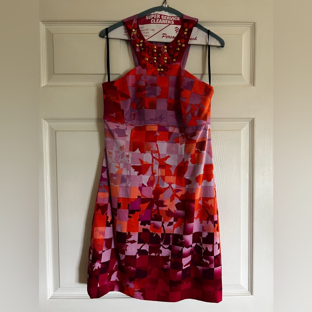 Designer dress perfect for any spring or summer wedding!